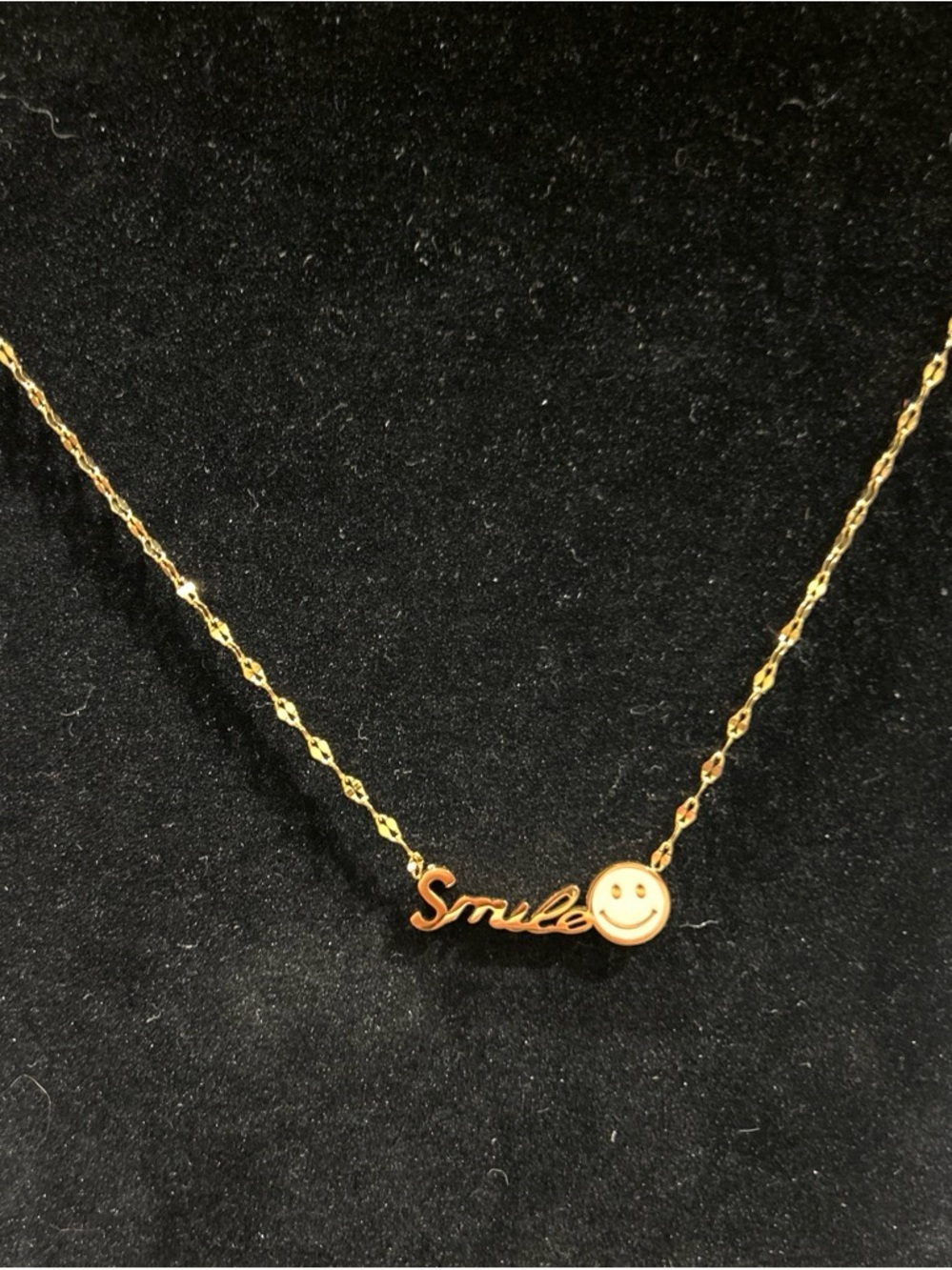 Gold color smile necklace